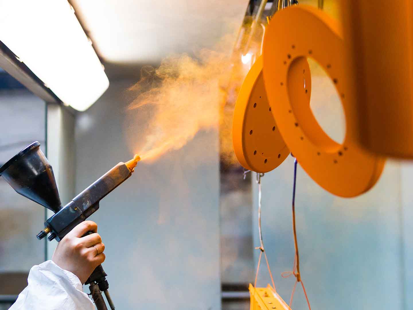 © Downs Powdercoating - spraying feature image